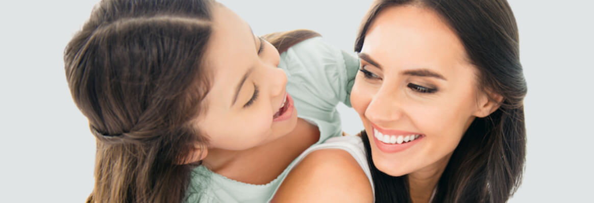 Smiling mother with her daughter